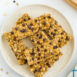 Nut free granola bars piled on a plate.