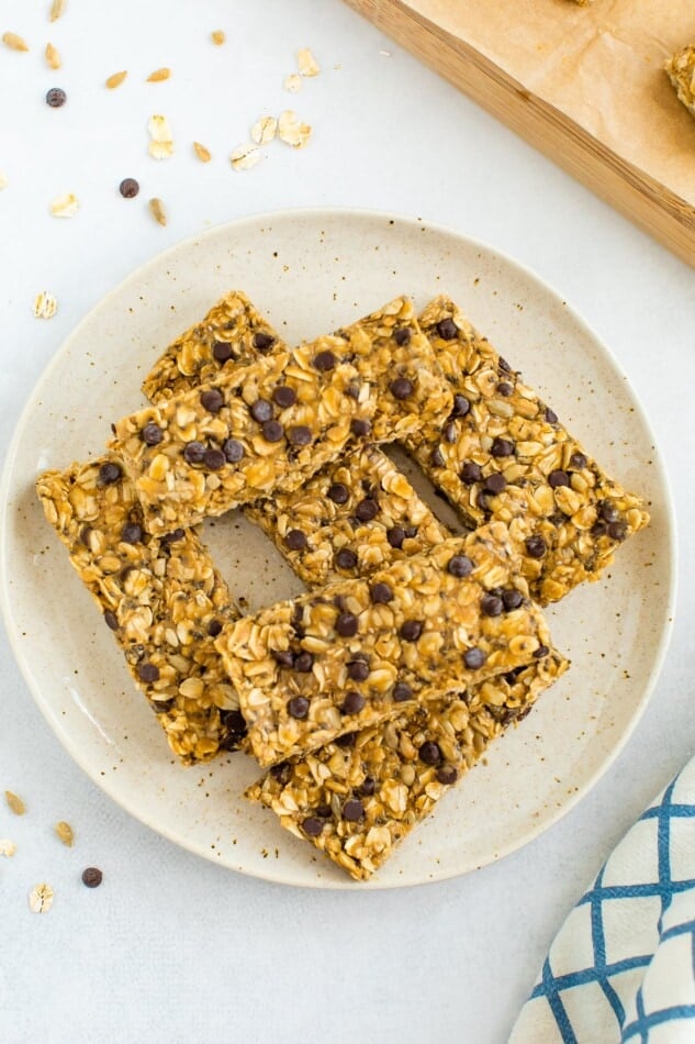 Nut free granola bars piled on a plate.