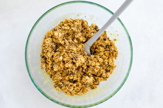 Mixing ingredients for nut free granola bars in a bowl.