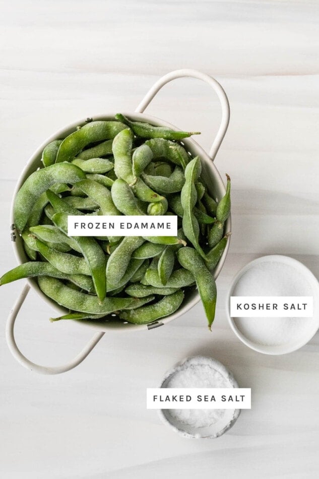 Ingredients measured out to make Easy Edamame: frozen edamame, kosher salt and flaked sea salt.