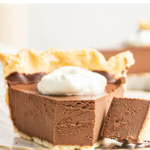 A slice exposing the texture of vegan chocolate pie.