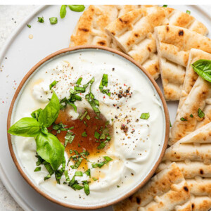 Whipped feta dip served with a platter of pita.