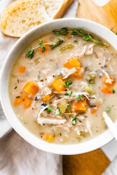 A bowl of slow cooker chicken and wild rice soup.