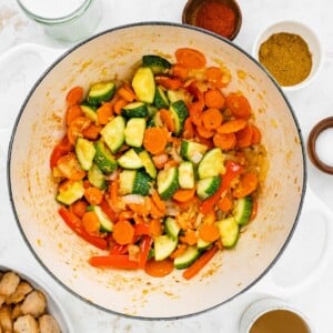 More vegetables added to pot.