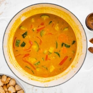 Vegetable curry cooking in a pot.