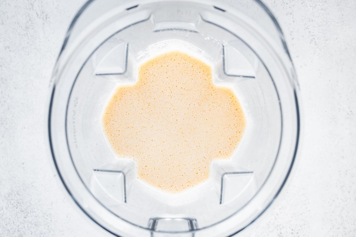 Clementine smoothie in a high powered blender.