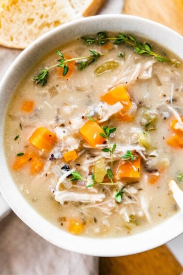 A bowl of slow cooker chicken and wild rice soup.