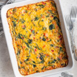 Hash brown casserole in a baking dish.