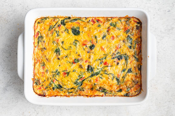 Vegetarian hash brown breakfast casserole in a baking dish.