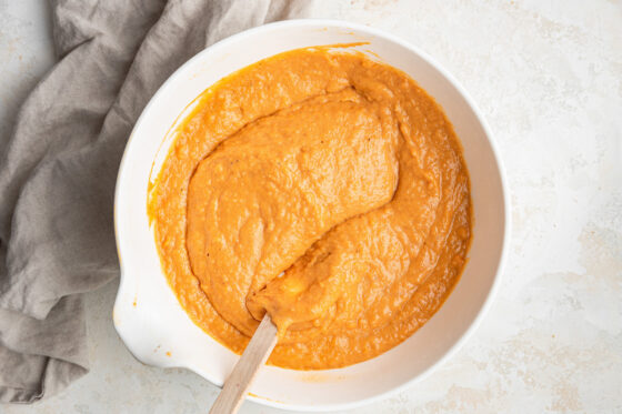 Sweet potato casserole filling mixed together in a bowl.