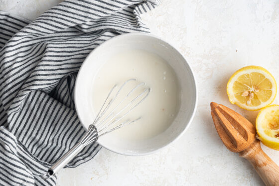 Lemon glaze in a bowl.