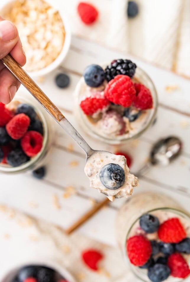 A spoon scooping a bite of oats.