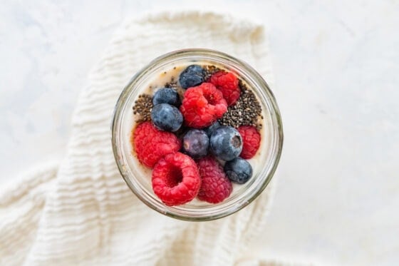 Mixed berries added to jar.