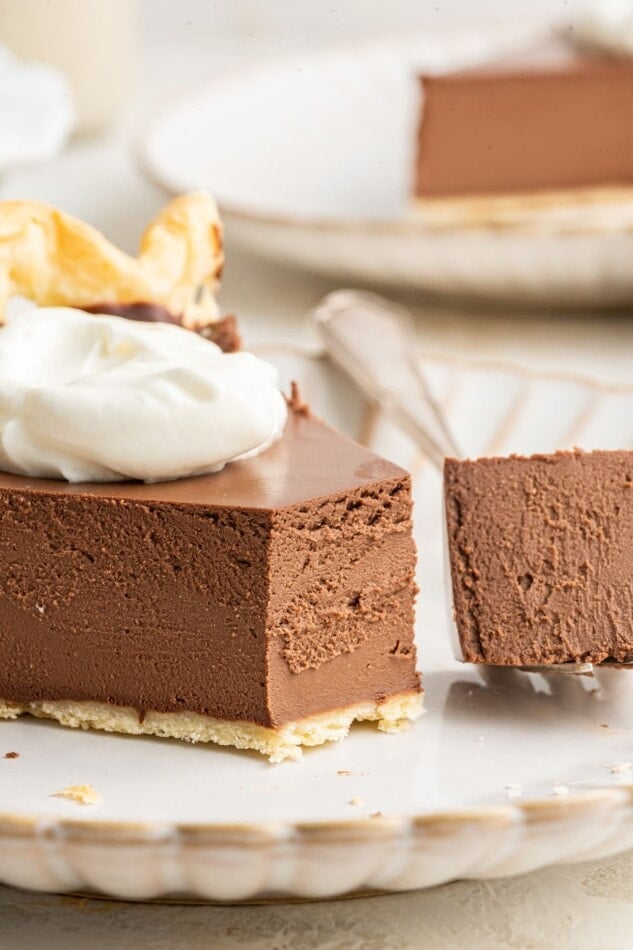 A slice exposing the texture of vegan chocolate pie.