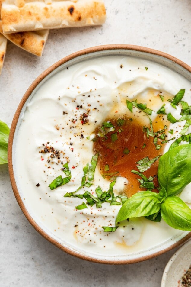 A bowl of whipped feta dip.