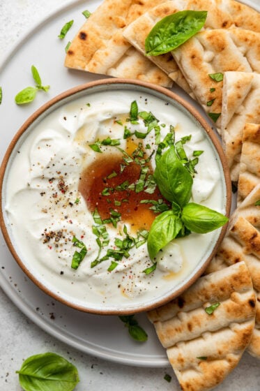 Whipped feta dip served with a platter of pita.