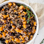 Wild rice stuffing in a serving bowl.