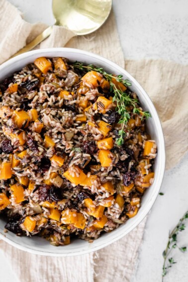 Wild rice stuffing in a serving bowl.