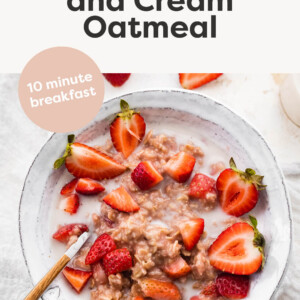 Bowl of Strawberries and Cream Oatmeal topped with dairy-free milk.