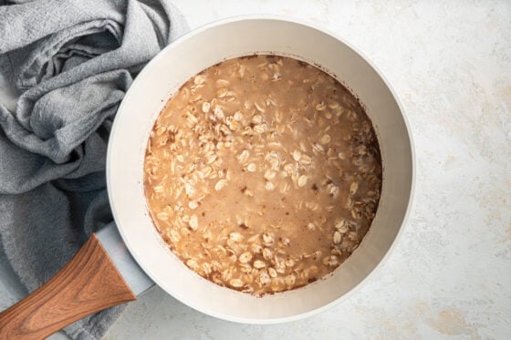 Oatmeal cooking in a sauce pan.