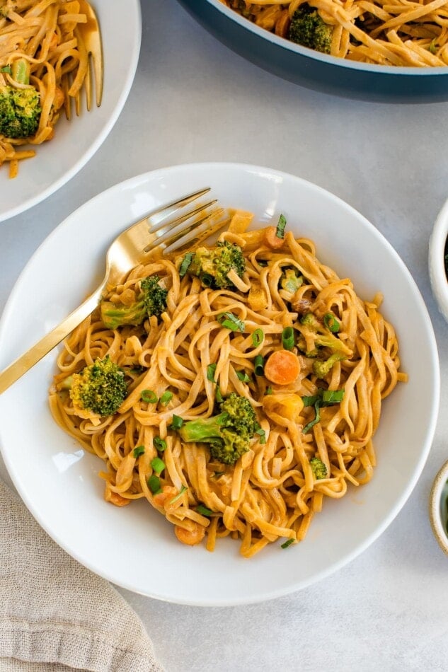 A serving of coconut curry SunButter noodles in a bowl.