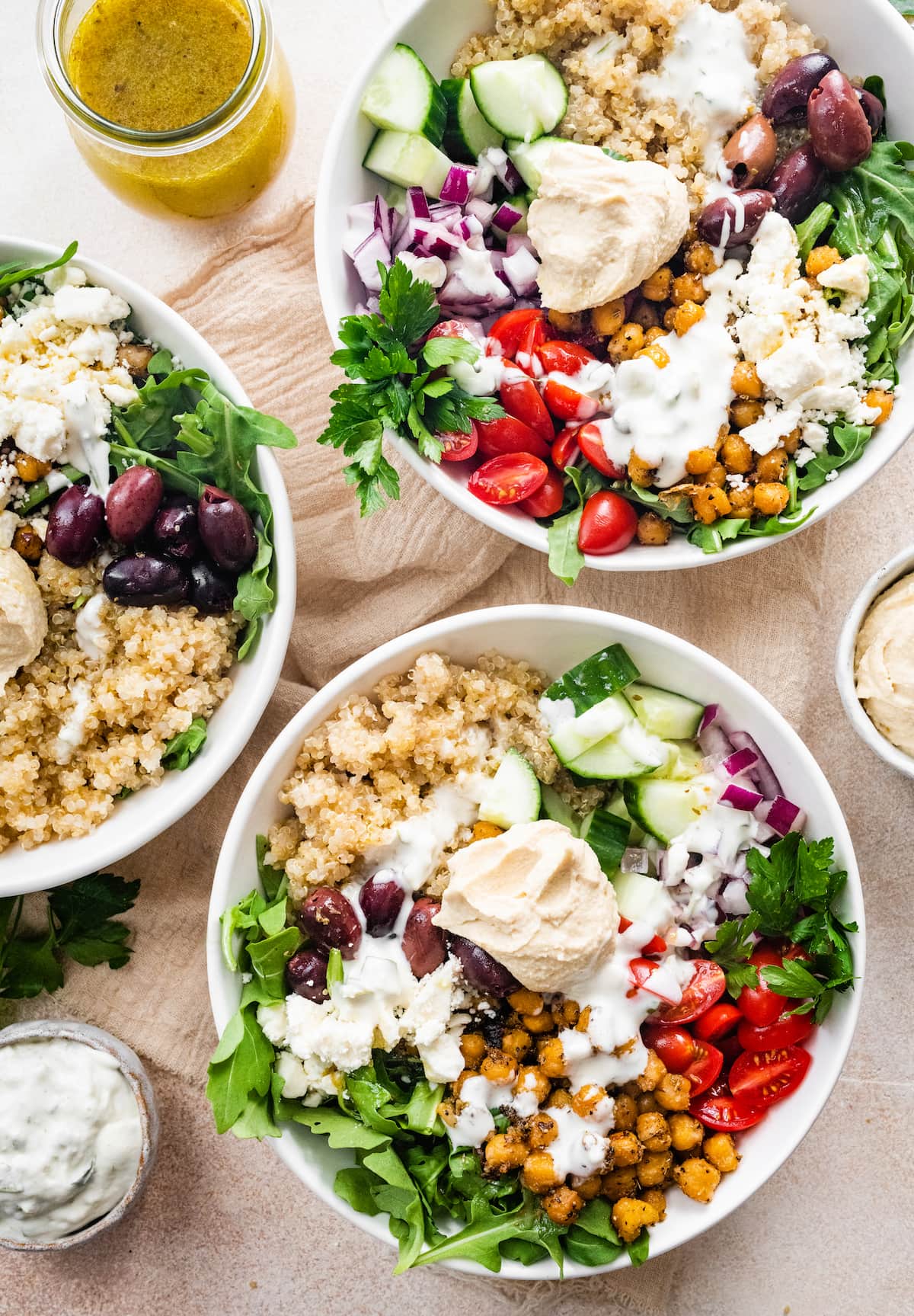 Three quinoa bowls.