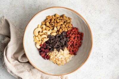 Ingredients for superfood trail mix in a bowl.