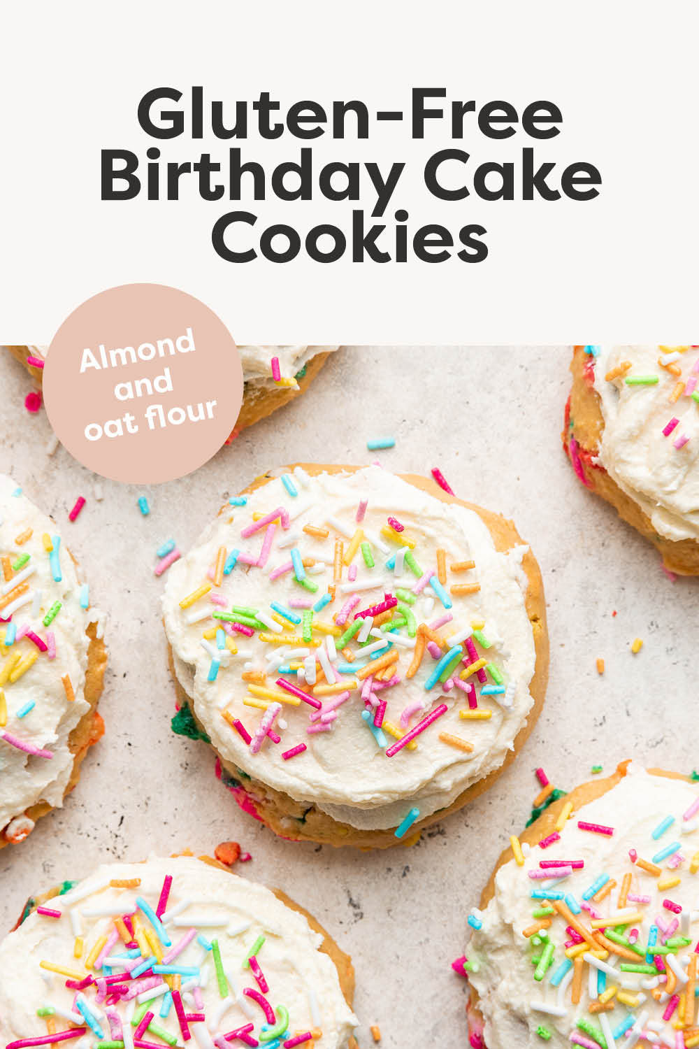 Birthday cake cookies topped with frosting and sprinkles.