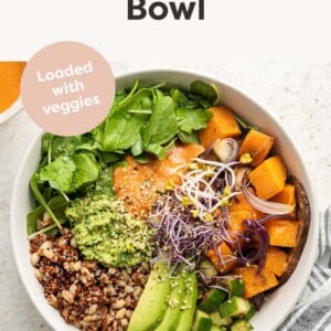 Mother Earth Bowl topped with lots of veggies.