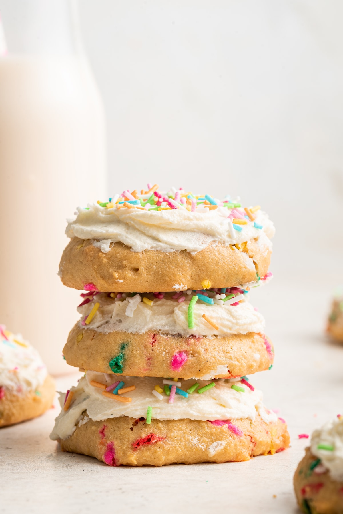 A stack of birthday cake cookies.