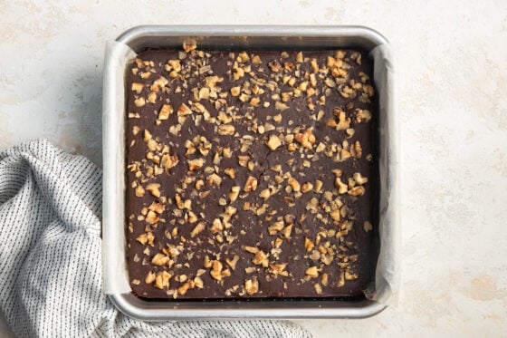 Baked black bean brownies in a square baking pan.