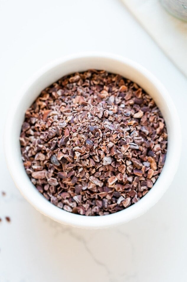 A bowl of cacao nibs.