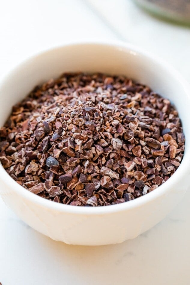 A bowl of cacao nibs.