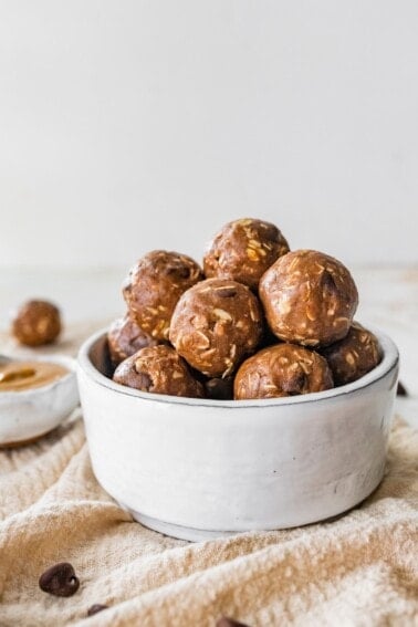 A bowl of chocolate peanut butter protein balls.