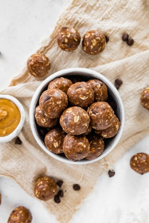 Chocolate peanut butter protein balls in a bowl.