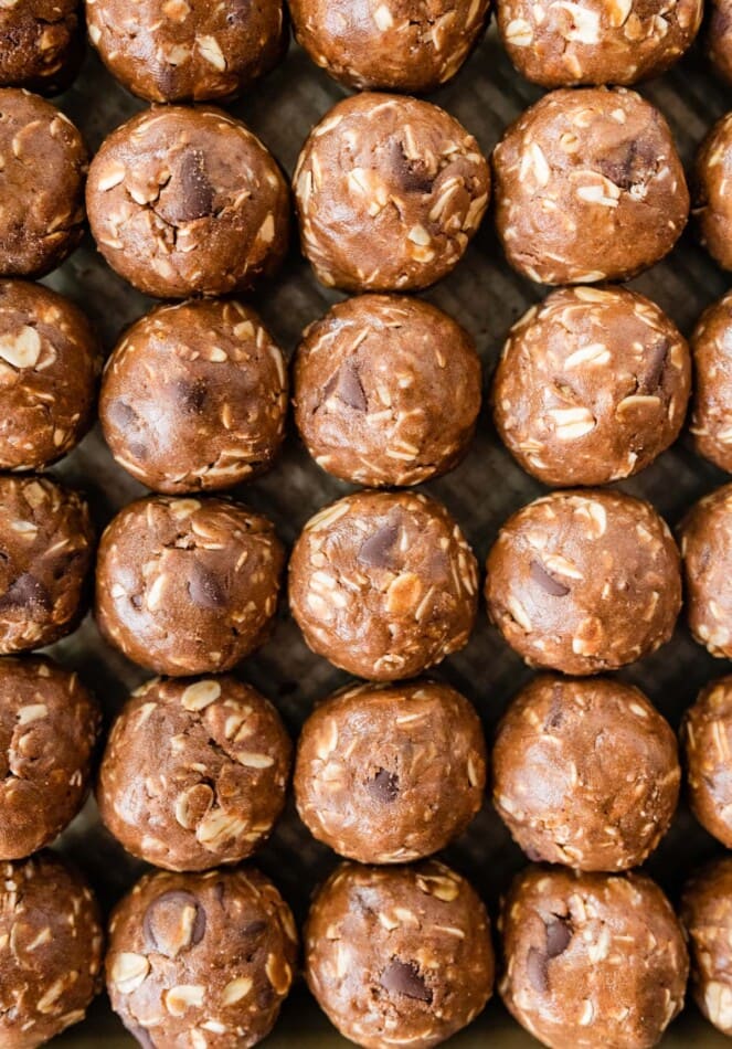 Rows of chocolate peanut butter protein balls.