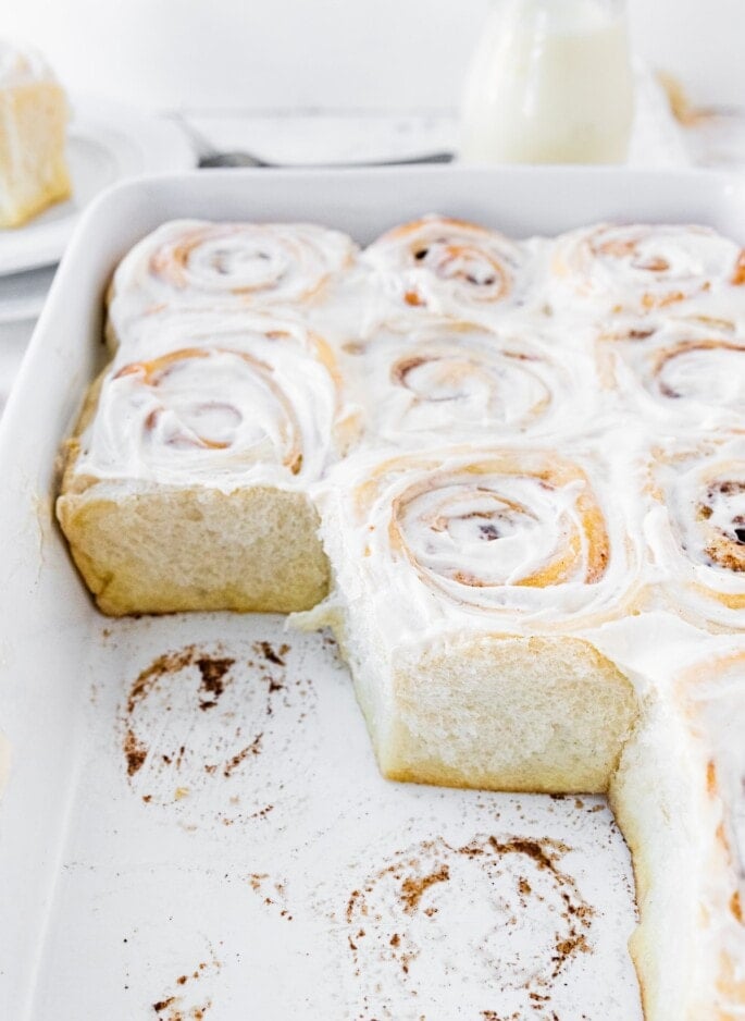 Cinnamon rolls in a baking dish.