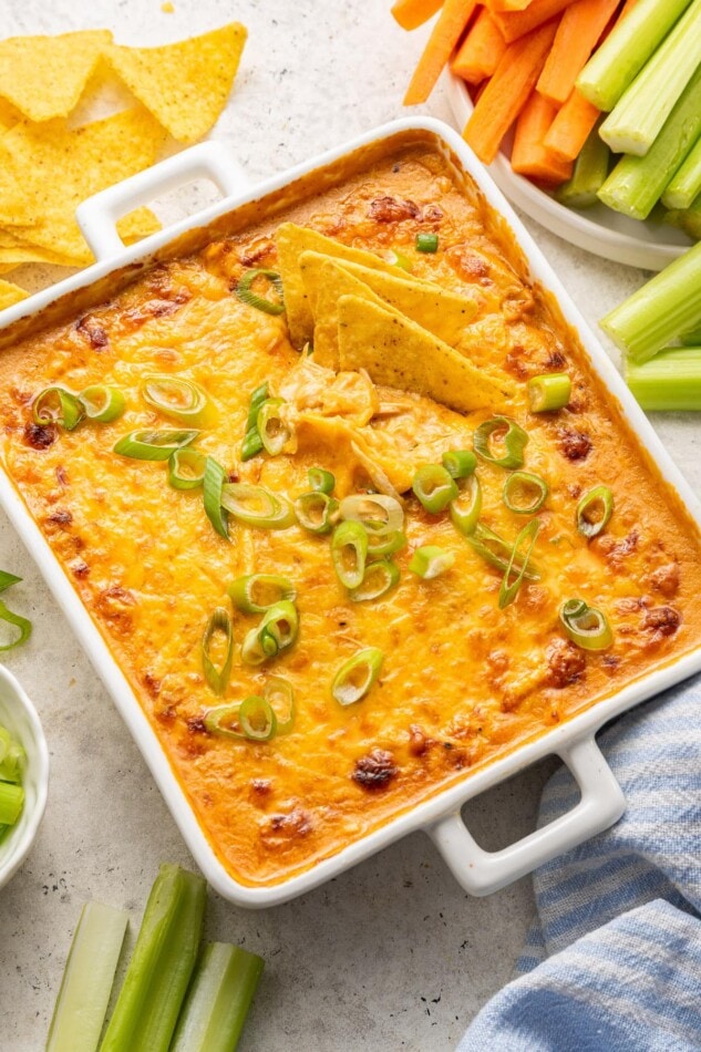 Chips dipped into healthy buffalo chicken dip.