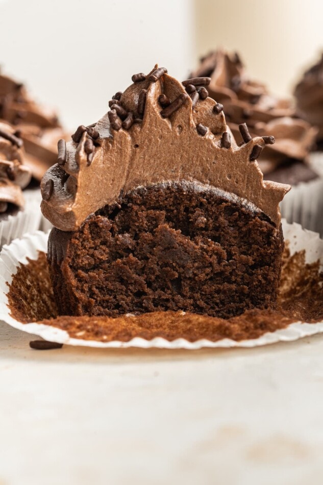 A cupcake cut in half exposing the texture inside.