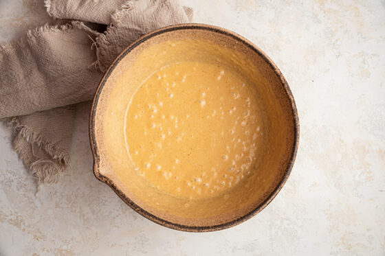 The beginning of cupcake batter in a bowl.