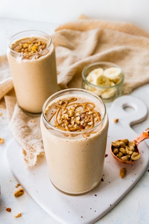 https://www.eatingbirdfood.com/wp-content/uploads/2022/12/peanut-butter-protein-shake-two-angle-633x950.jpg