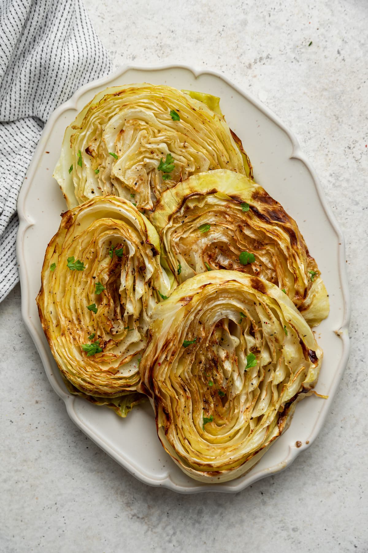 Roasted cabbage on a serving platter.