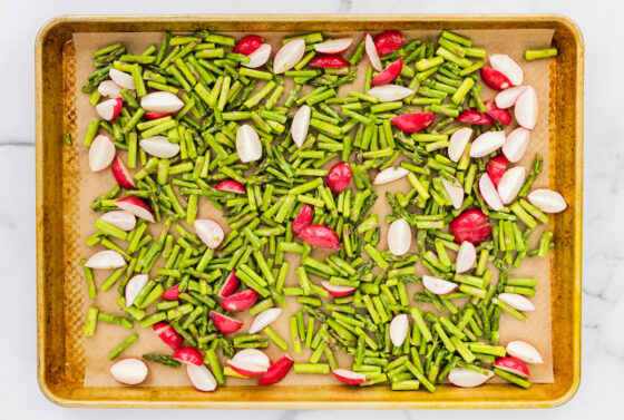 Vegetables to be roasted on a sheet pan.