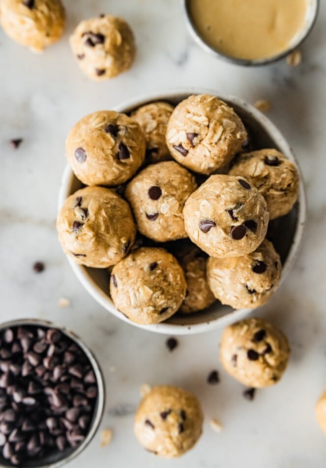 A bowl of tahini chocolate chip protein balls.