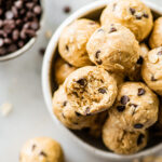 A bowl of tahini chocolate chip protein balls.