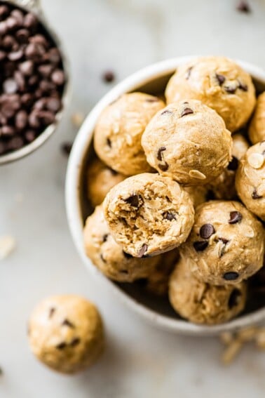 A bowl of tahini chocolate chip protein balls.