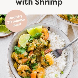 Bowl of green curry shrimp and rice.