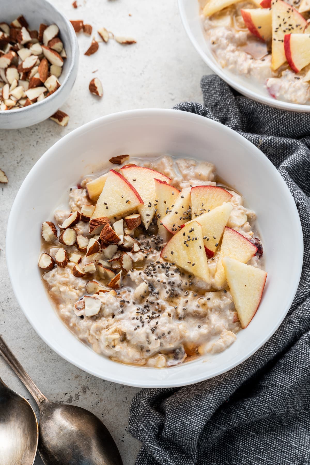 Angled bowl of bircher muesli.