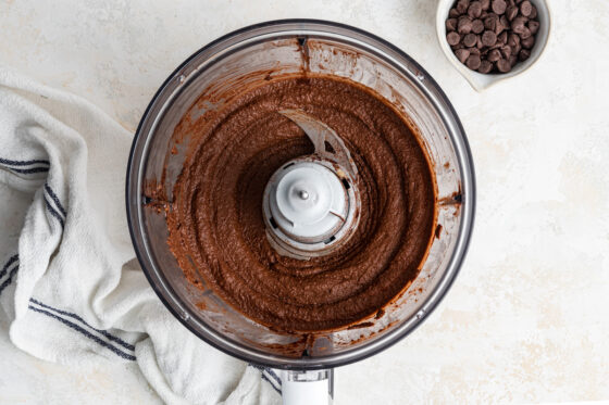 Ingredients for chickpea brownies blended in a food processor.