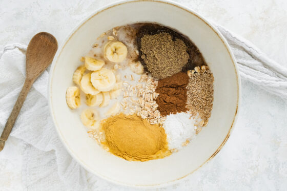 Ingredients for lactation baked oatmeal in a bowl.